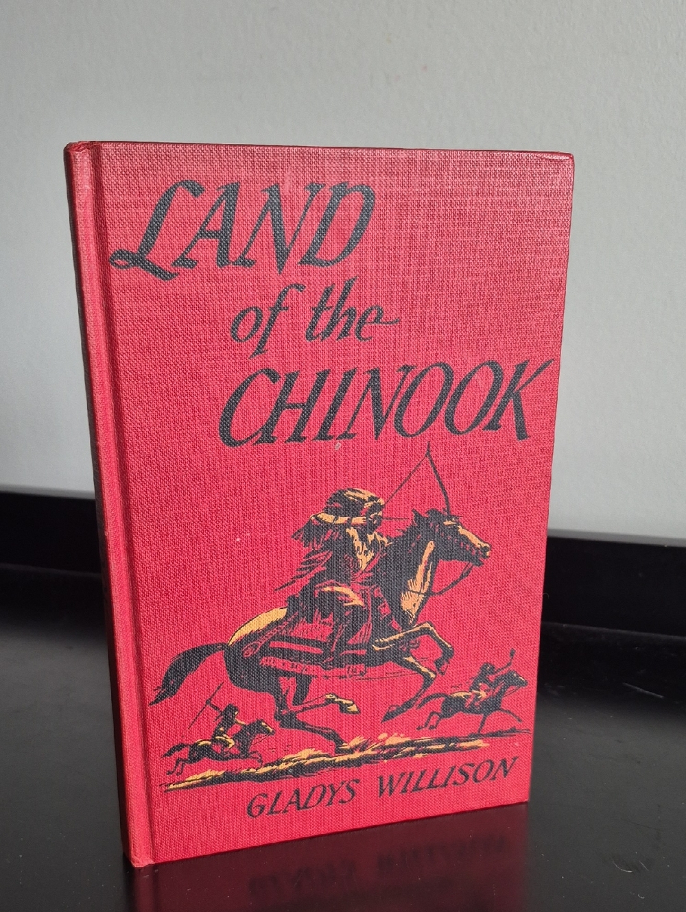 Land of the Chinook Hardcover Book - Red
